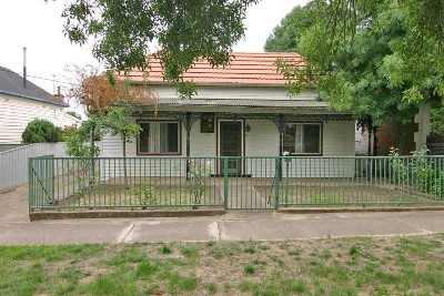 CENTRALLY LOCATED 3BR HOME WITH SHEDDING Picture