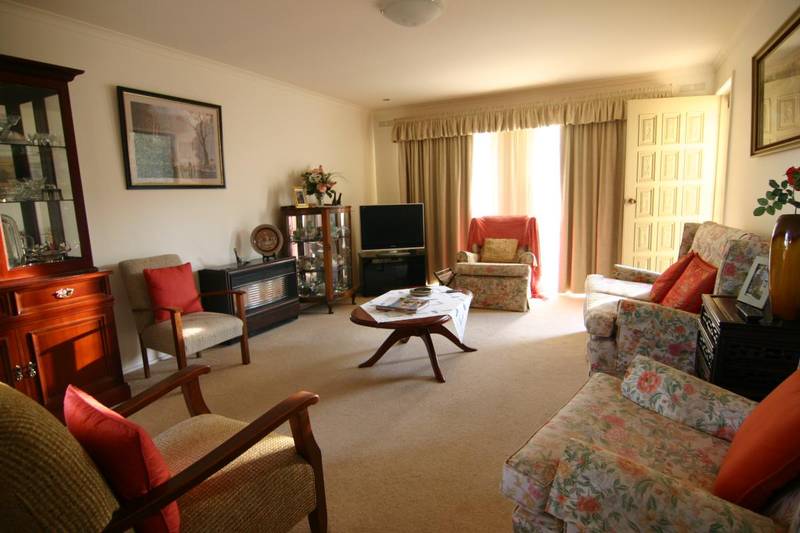 Immaculate Central Brick Home Picture 2