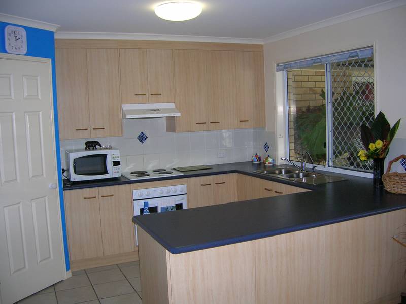 Tropical PARADISE is FOUND with a pool inground! Picture 3