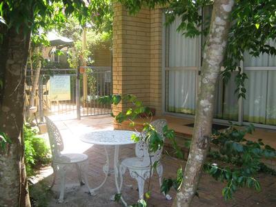 Resort Living in tranquil garden surrounds Picture Resort Living in tranquil garden surrounds Picture