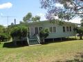 HOME AND SHED ON DEEP RED LOAM Picture