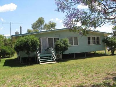 HOME AND SHED ON DEEP RED LOAM Picture