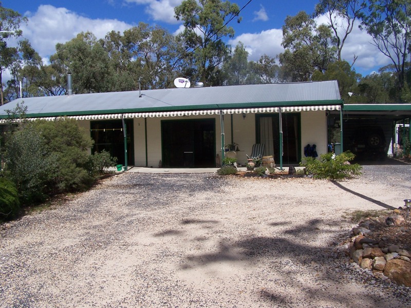 SECLUDED 30 ACRES with WATER Picture 1