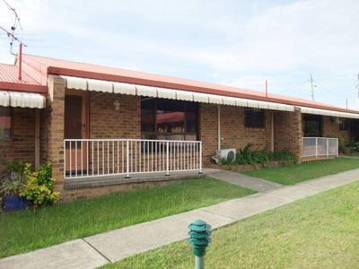 Roomy Palm Court Unit complete with garage Picture