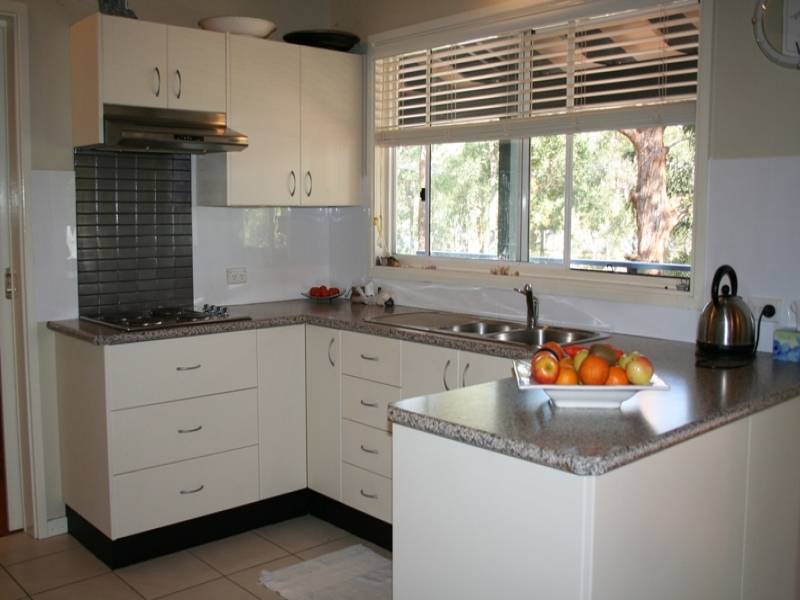 Filtered water views over professional landscaping Picture 2