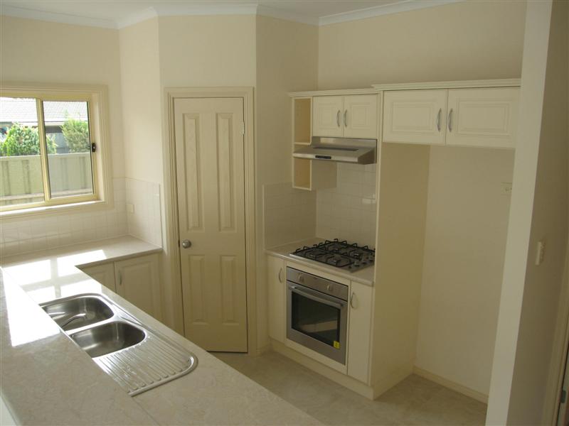 AFFORDABLE ~ Brand New Courtyard Home Picture 2