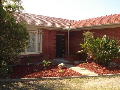 Classic Colonial Convenience with Development Potential Picture