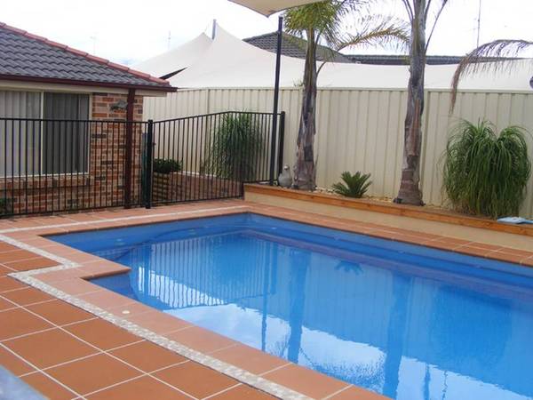 A POOL AND GREAT ENTERTAINING AREA FOR YOUR ENJOYMENT. Picture