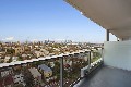 BRAND NEW APARTMENT WITH SWEEPING CITY VIEWS! Picture