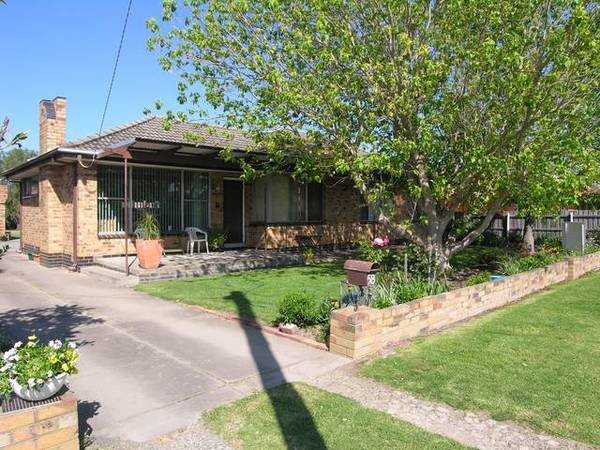 MORE THAN JUST A SUPERBLY LOCATED 4/B/R HOME Picture 1