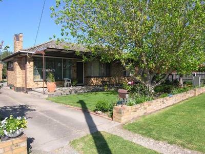 MORE THAN JUST A SUPERBLY LOCATED 4/B/R HOME Picture