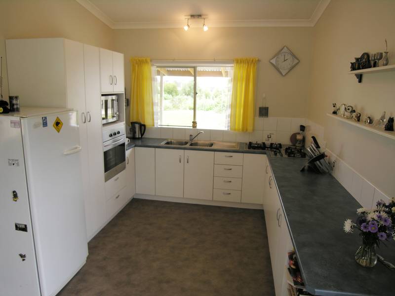 SPACIOUS 4/B/R HOME ON 1 ACRE WITH TOWN WATER Picture 2