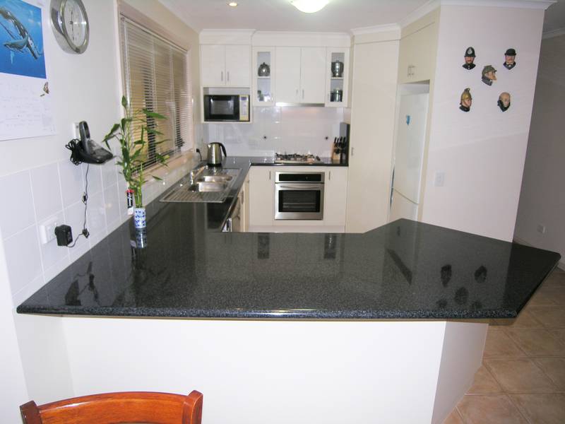 INVEST IN THIS APPEALING THREE BEDROOM HOME Picture 3