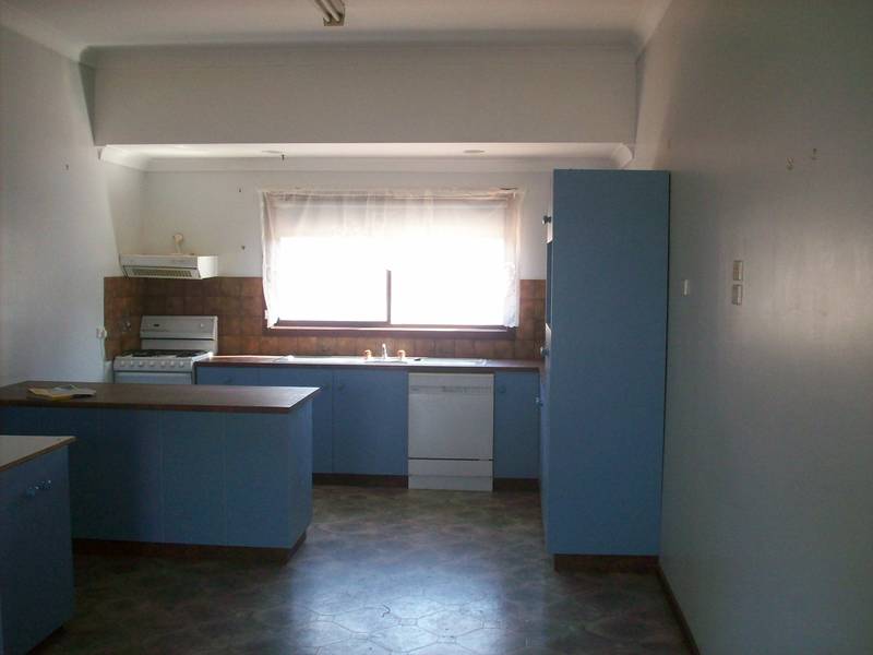 LOOKS CAN BE DECIEVING.....HUGE FOUR BEDROOM HOME Picture 3