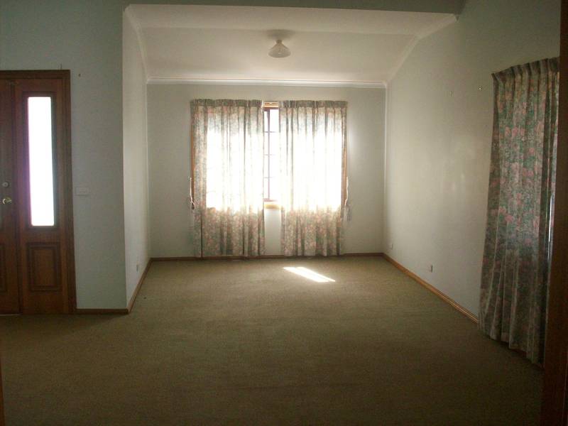 LOOKS CAN BE DECIEVING.....HUGE FOUR BEDROOM HOME Picture 2