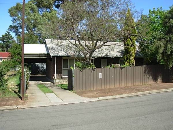 Neat Three bedroom home with Heating & Cooling Picture 1