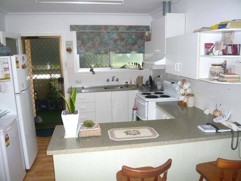 THREE BEDROOM HOME WITH INCOME Picture 2