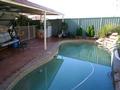 FAMILY HOME + INGROUND POOL IN A CUL-DE-SAC - ENOUGH SAID! Picture