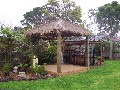 A Tropical Rear Garden Setting & Classic 3 Bedroom Cream Brick Veneer, Bungalow / Games Room in Handy Location Picture