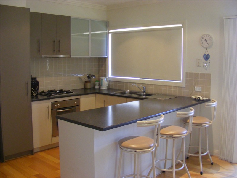 Here's a Must See 3 Year Old Townhouse with Separate Drive & a Wonderful Garden & Fabulous Street Appeal Picture 3