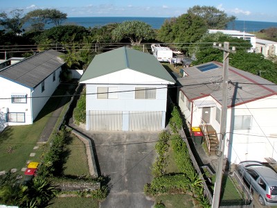 BEACHFRONT BARGAIN BECKONS! Picture