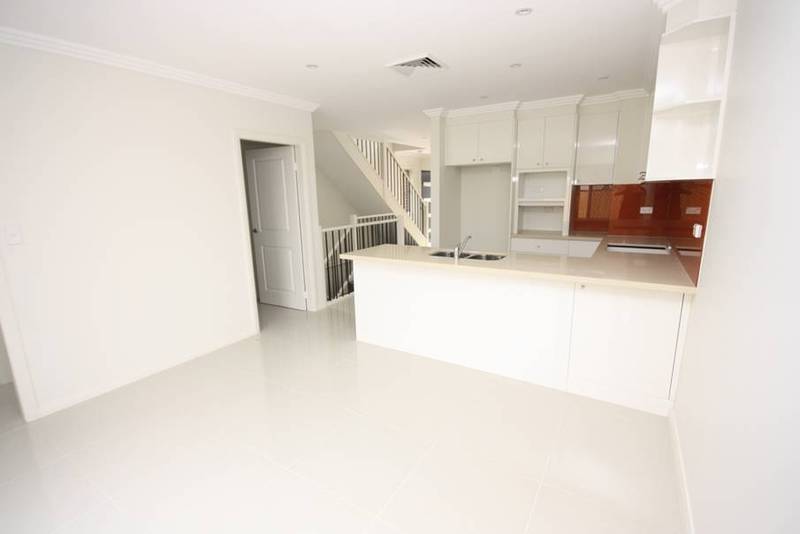 HAVING A CHOICE OF 3 BRAND NEW TOWNHOUSES...... THATS GOLD! Picture 2