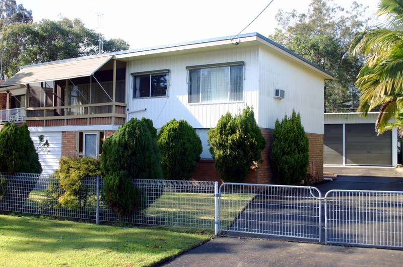 Opposite the Lake & Packed with Potential Picture 2