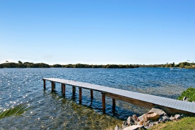 ABSOLUTE WATERFRONT HOME SITTING ON OVER 1000M2 WITH PRIVATE JETTY, BOAT RAMP AND MOORINGS Picture