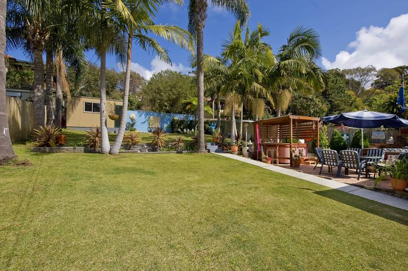 A backyard perfect for both kids & entertaining Picture