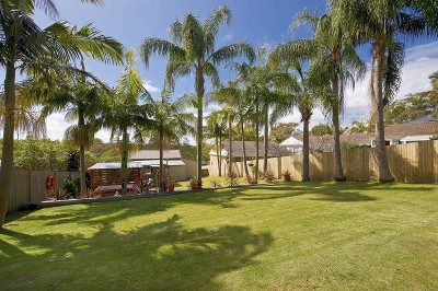 A backyard perfect for both kids & entertaining Picture