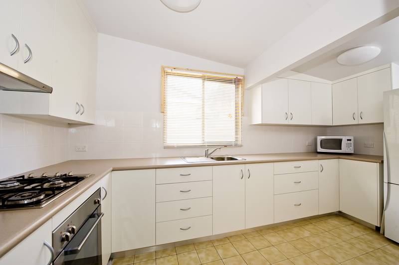 A backyard perfect for both kids & entertaining Picture