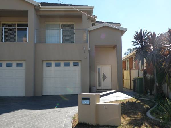 ABSOLUTELY STUNNING 4 BEDROOM NEAR NEW DUPLEX Picture 1