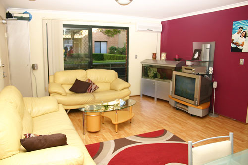 FIRST FLOOR PODIUM APARTMENT! Picture 1