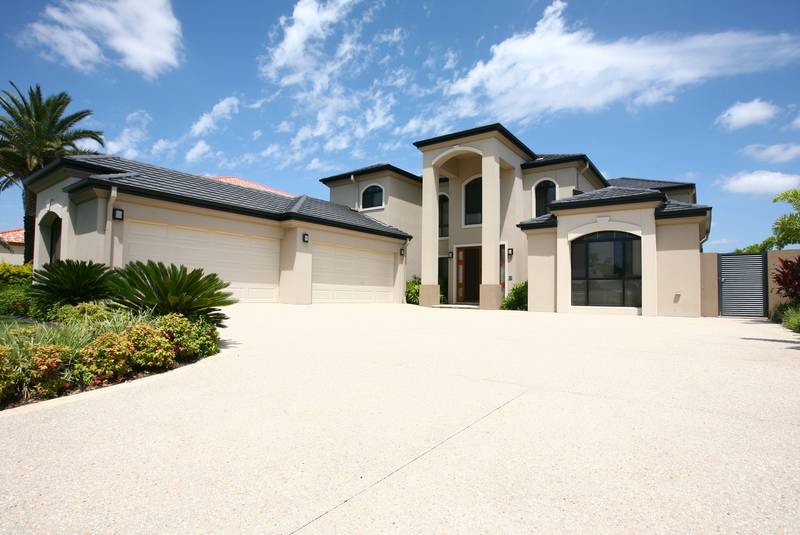 ENORMOUS 5 BEDROOM WATERFRONT HOME + 4 CAR GARAGING & PONTOON IN A BLUE CHIP FAMILY ADDRESS Picture 1