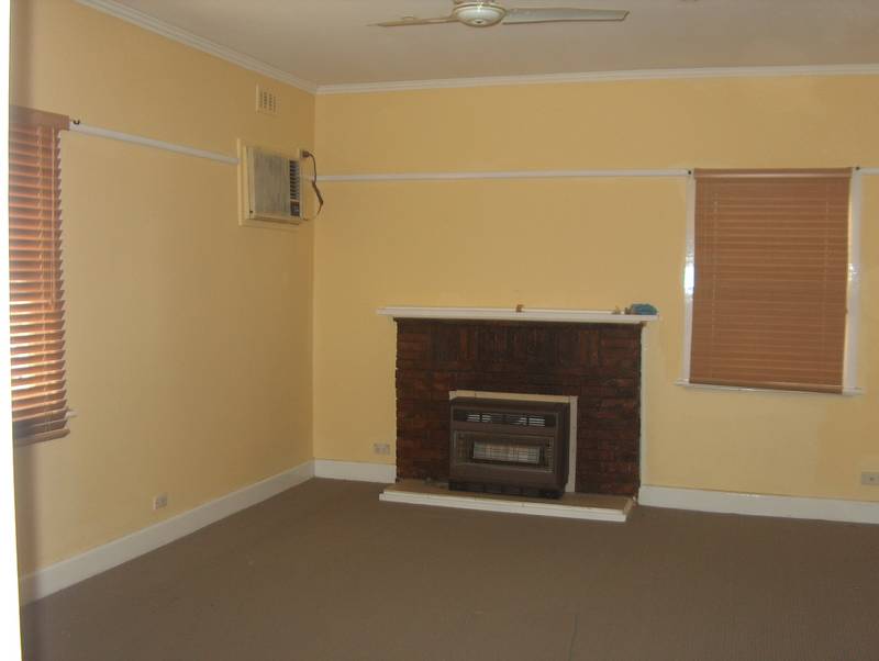 Freshly painted 3 Bedroom with well fenced yard. Picture