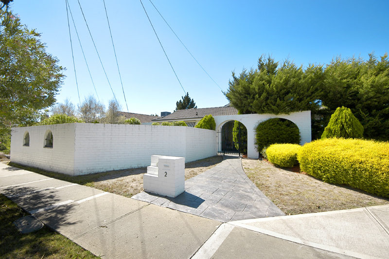 Behind the White Fence Picture 1