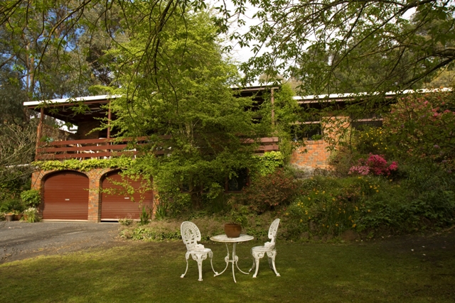 Enjoy the pool in a tranquil garden setting Picture 1