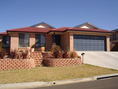 QUALITY BUILT AS NEW HOME IN ELEVATED POSITION Picture