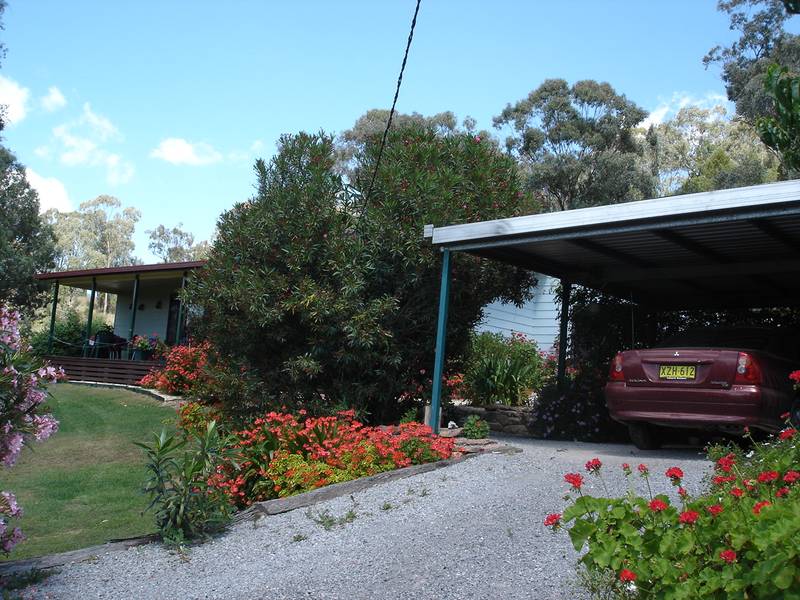 AS NEAT AS YOU WILL FIND ON 13.6 PEACEFUL PRIVATE ACRES Picture