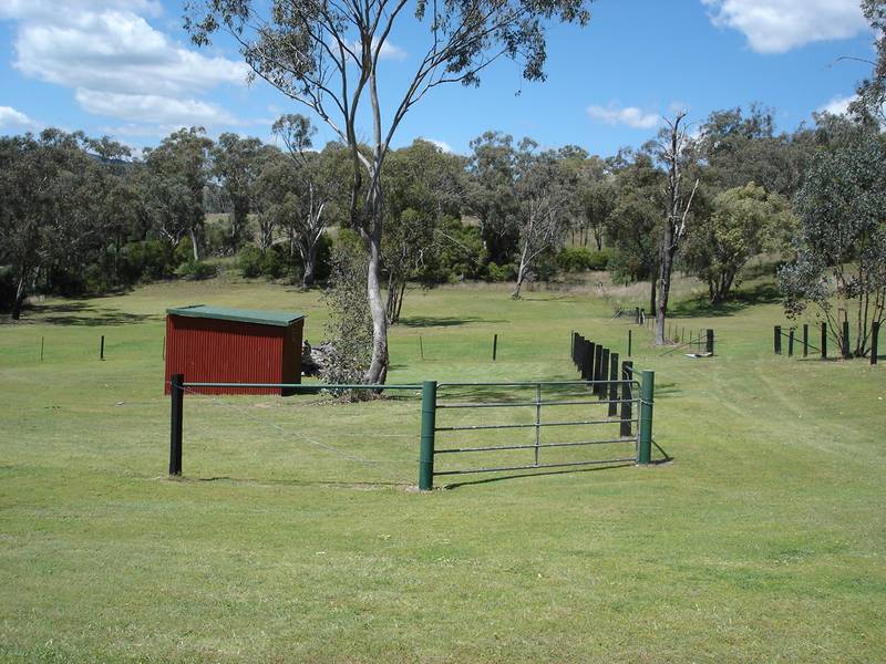 AS NEAT AS YOU WILL FIND ON 13.6 PEACEFUL PRIVATE ACRES Picture