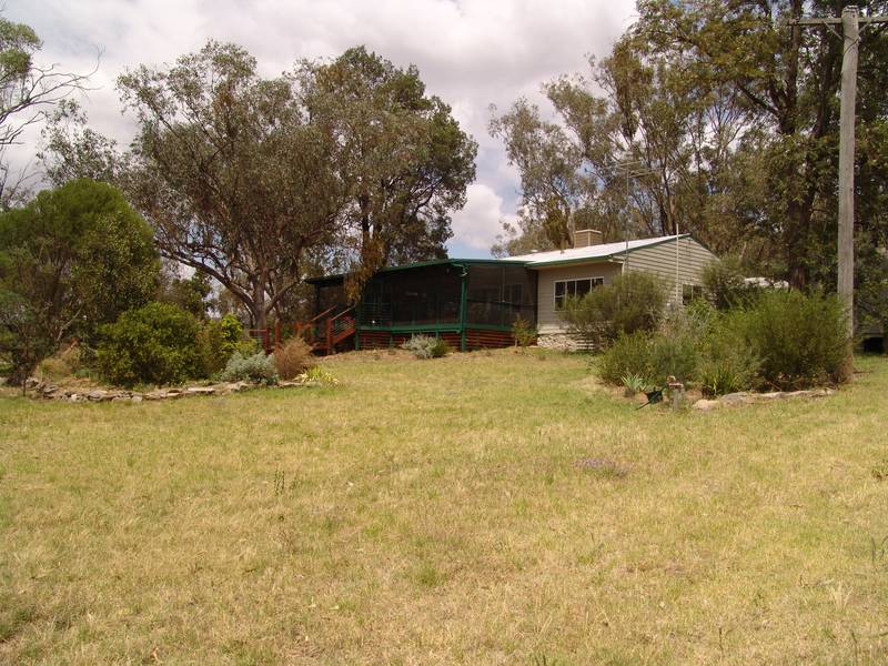 DELIGHTFUL HOME IN NATIVE GARDENS ON 52 ACRES AND PRICE IS REDUCED TO SELL Picture 1