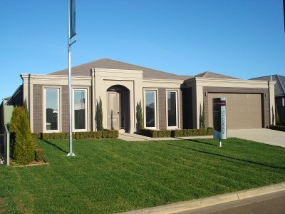 New Display Home with over $100,000 of extra's - available with vacant possession Picture