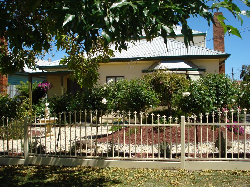 Delightfully Decieving Four Bedroom Home Picture 2