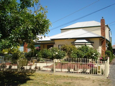 Delightfully Decieving Four Bedroom Home Picture