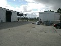 2 CLEAR SPAN WAREHOUSES WITH HARDSTAND Picture