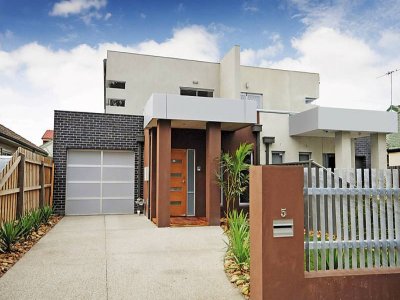 This 2 story Town Residence is brand new - never been lived in! Picture 1