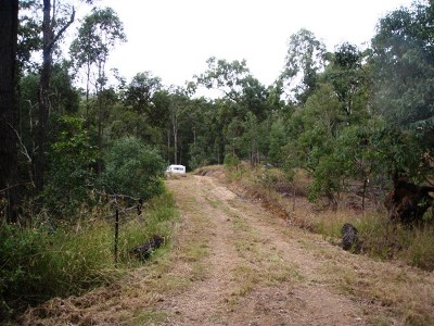 Escape to this tranquil acreage land! Picture