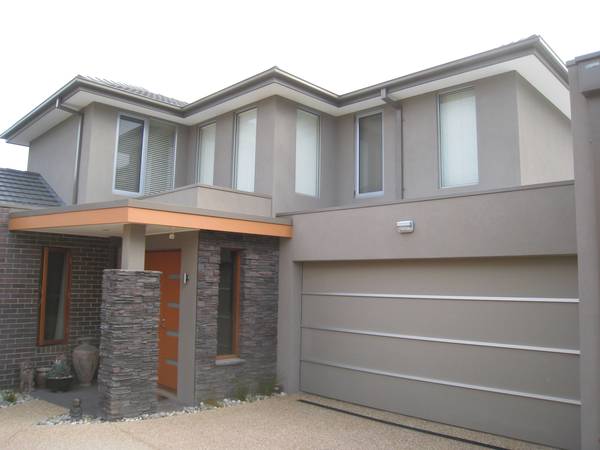 Stunning 3 bedroom townhouse with double garage and heated pool Picture 1