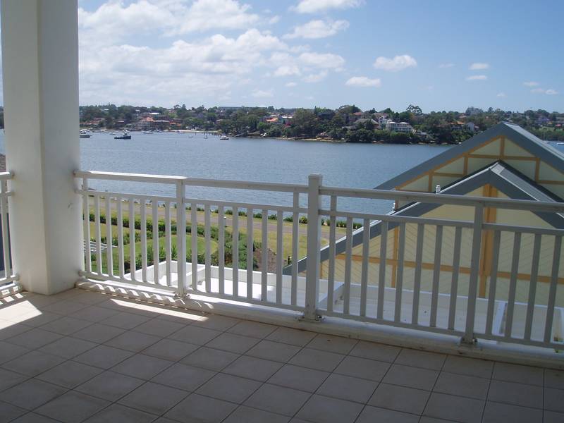 Serene Waterside Living Picture 1