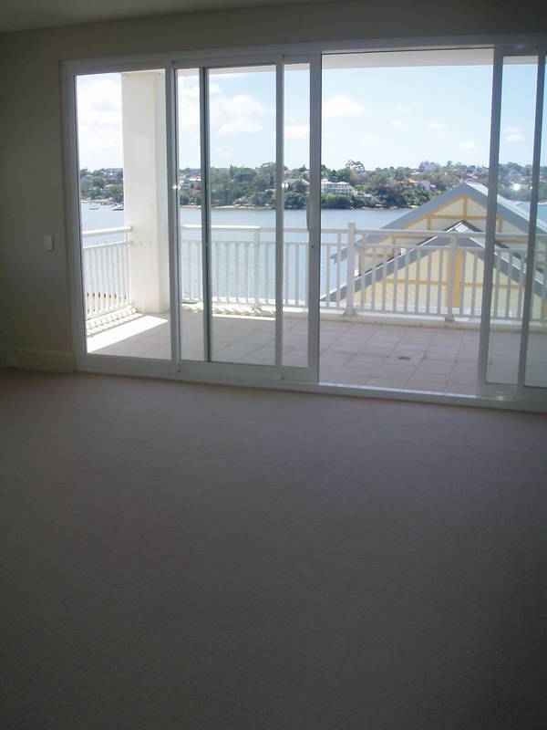 Serene Waterside Living Picture 2